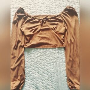 Burnt brown crop top with a bowl, it slides at the shoulder,soft,ALL SALES FINAL